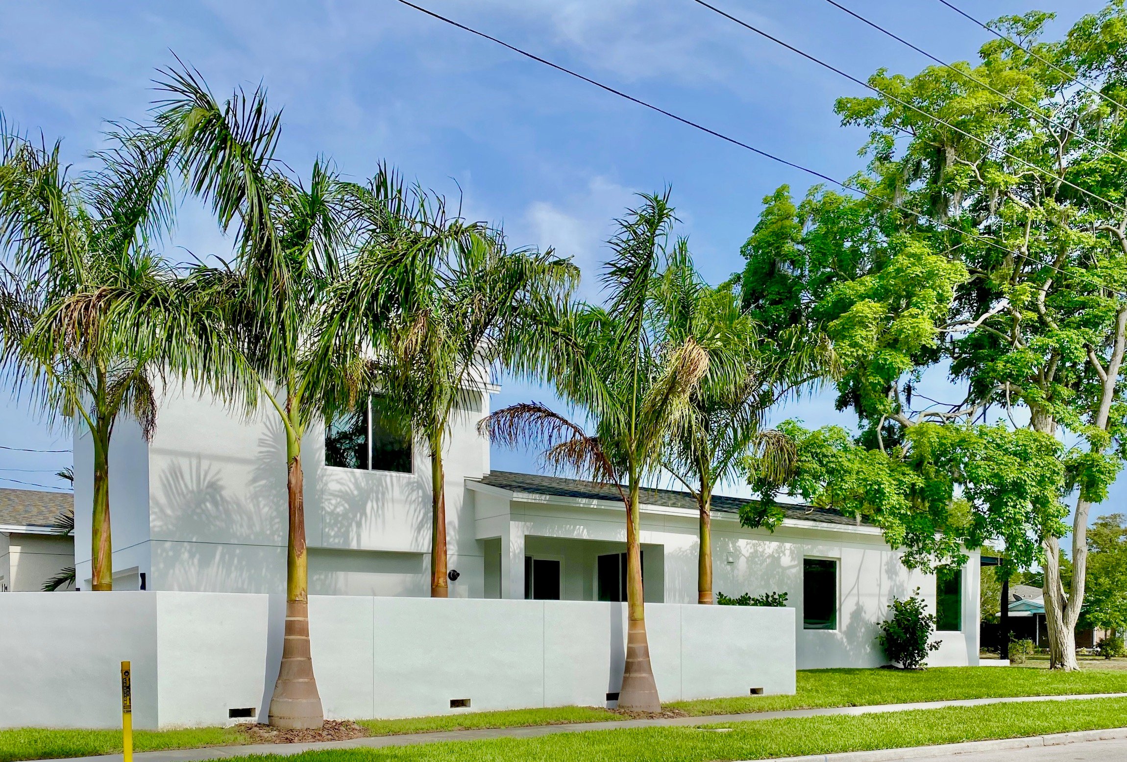 This home was designed for a narrow lot. Located on Dartmouth Ave. at 51st Street. This is the west facing Side of the home.
