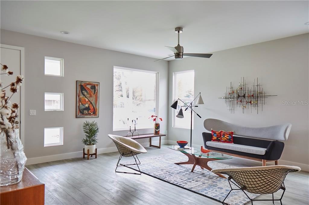 But Light fills this home at 5045 Dartmouth Ave. N. Also the room is decorated with authentic Mid Century Modern decor.