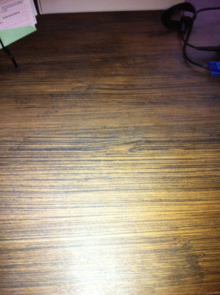 Up-close view of the faux wood grain.