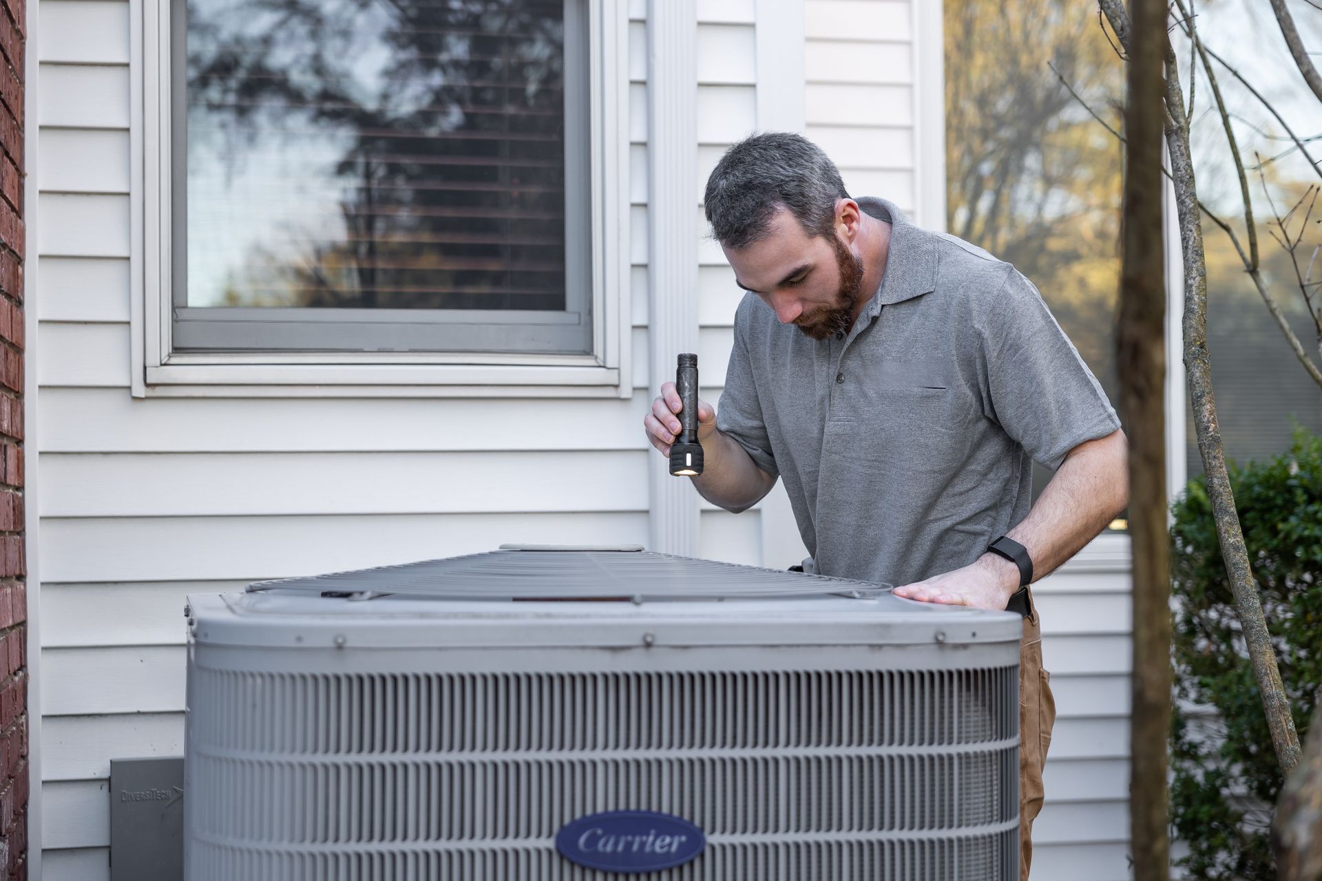 A home inspector checking a house during the option period