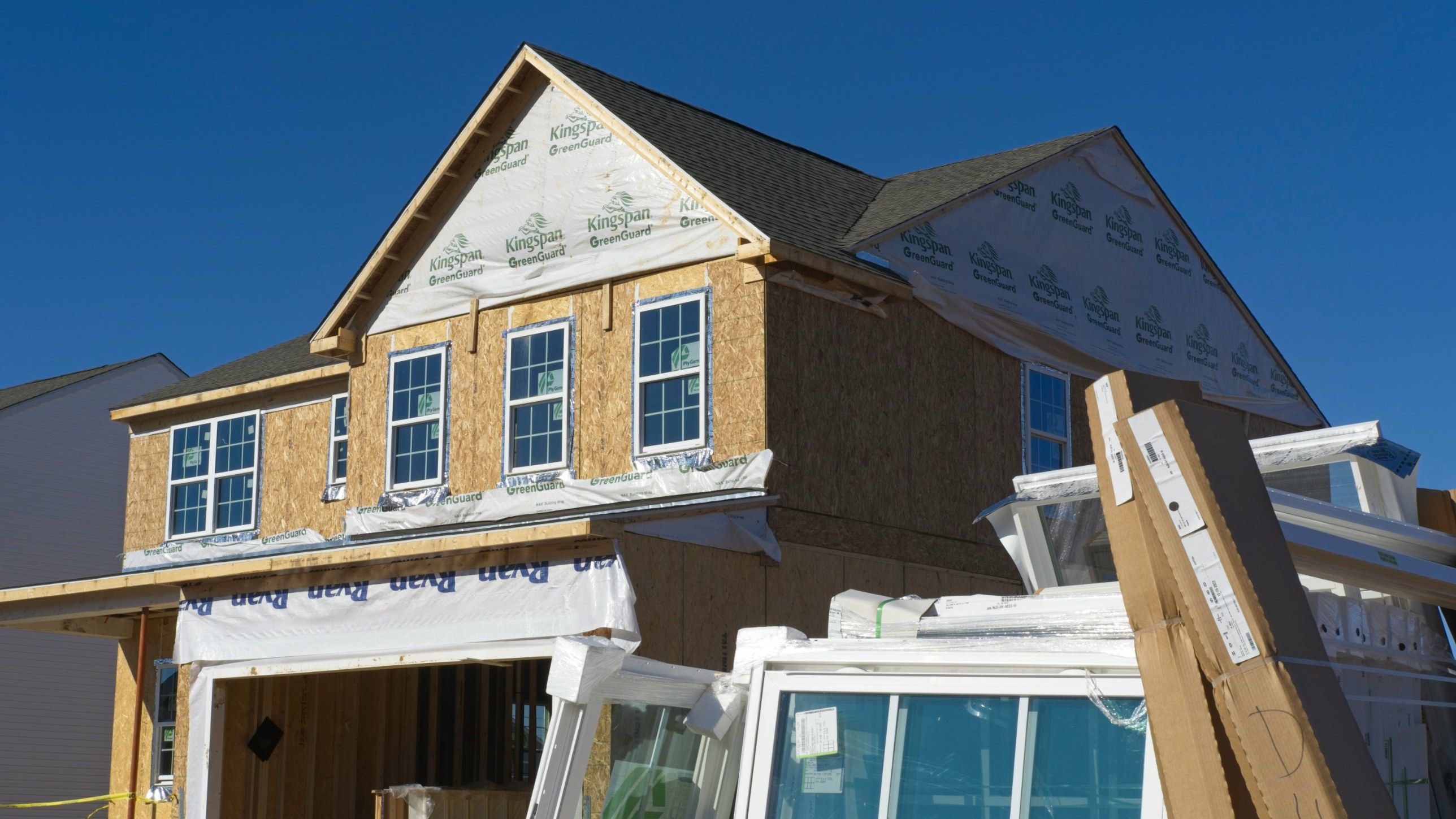 Two-story new construction home being built in Denton County