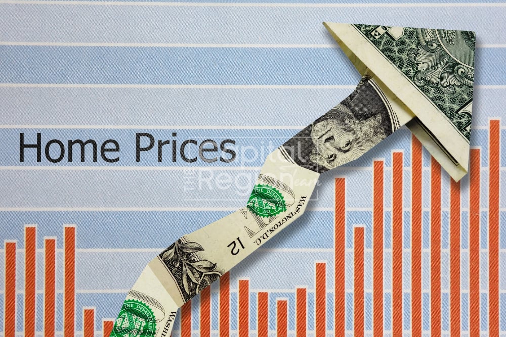 Rising home price chart with orange bars and a dollar bill arrow.
