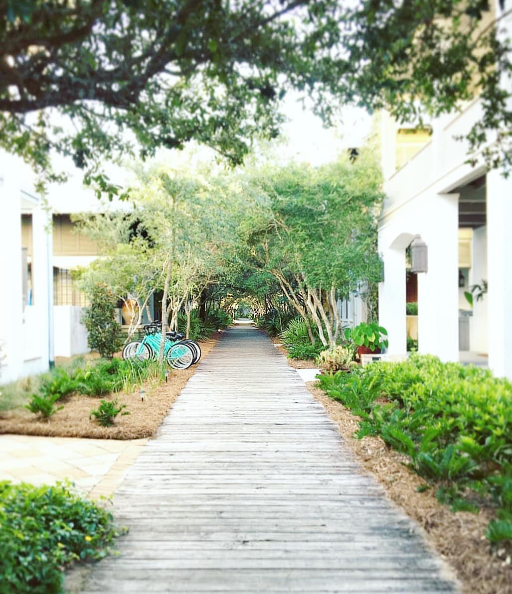 An aerial view of a walkable 30A beach community illustrating the compact, pedestrian-friendly layout that supports low-friction daily living without reliance on a car.