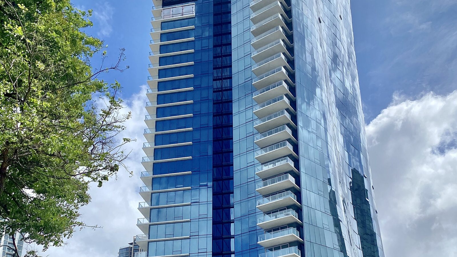 Blue glass condominium tower on Ala Moana Boulevard in Kakaako