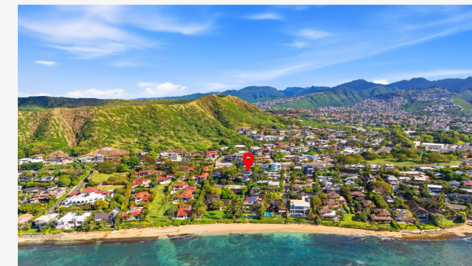 Aerial view of 245 Palaoa Place with Diamond Head crater rising behind the Black Point neighborhood