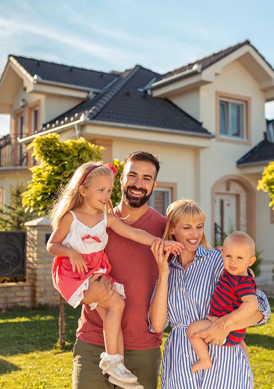 happy home buying couple being handed keys to new home in denver suburb