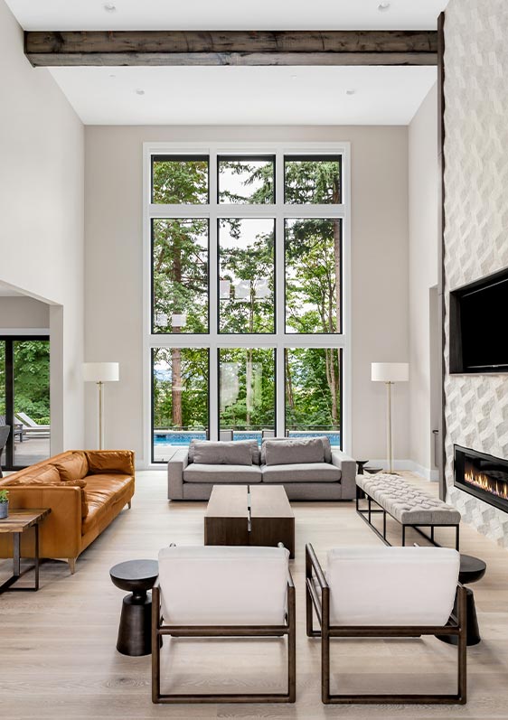 luxury white living room interior with large windows