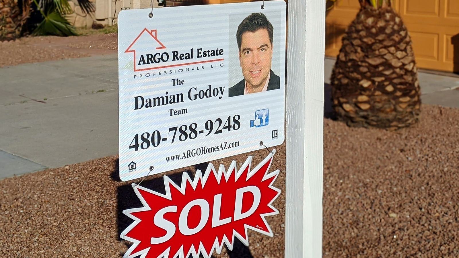ARGO Real Estate Team SOLD sign in front of a Southeast Valley home