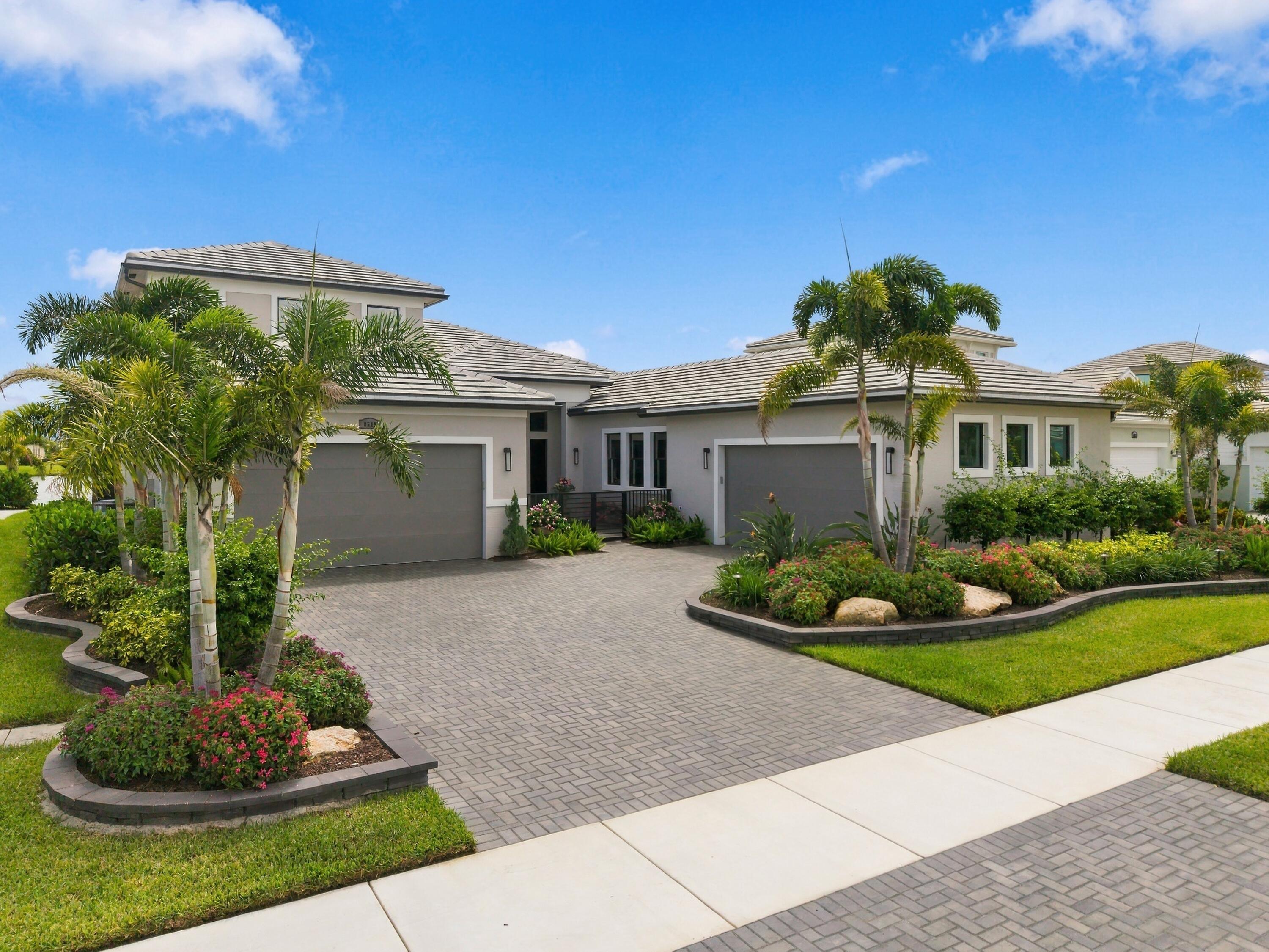 Front exterior of 8549 SW Felicita Way in PGA Verano