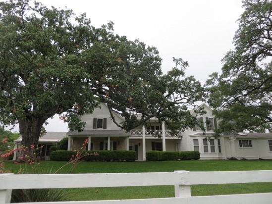 The “Texas White House” in the shade of a 300-year old Texas live oak.