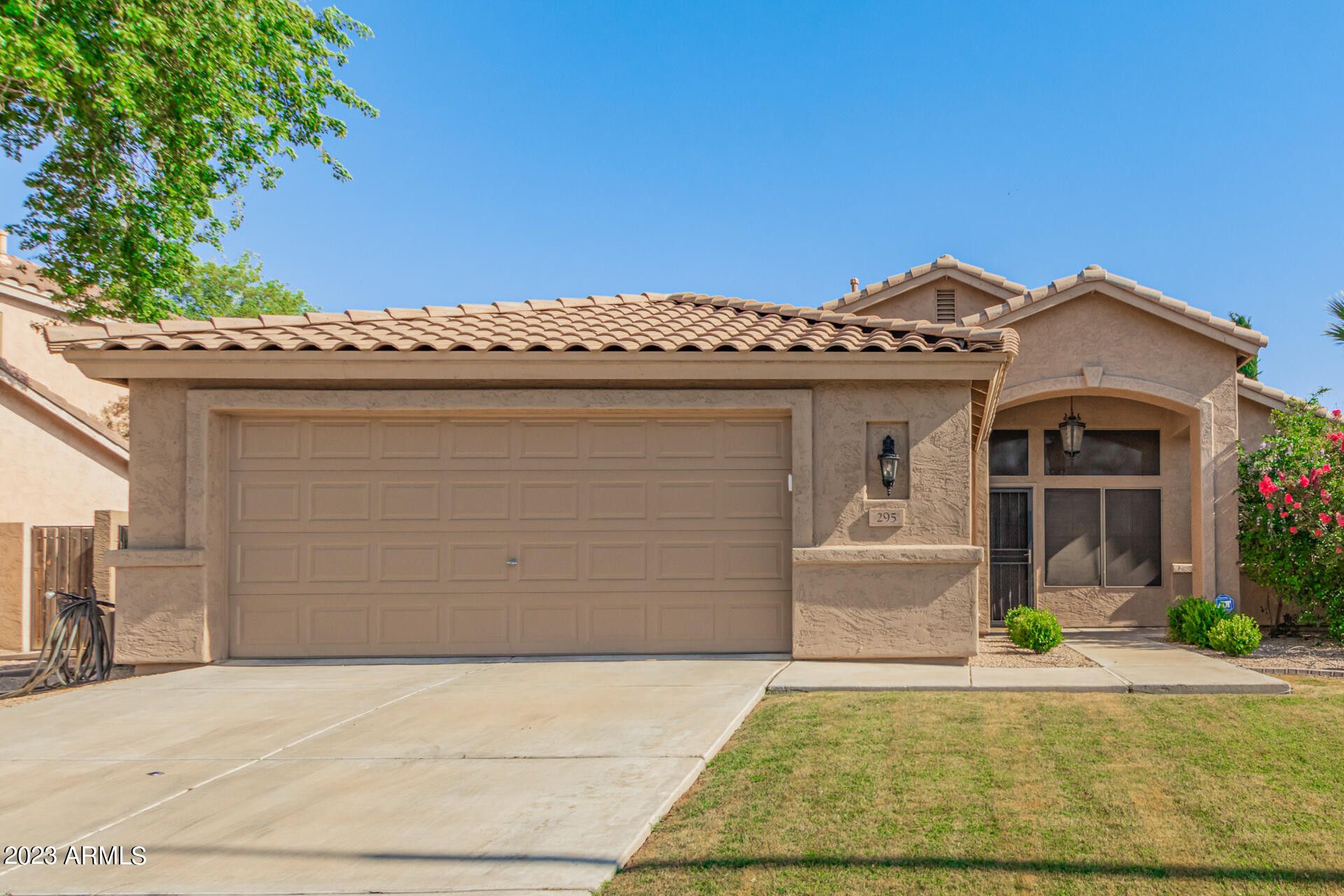 Phoenix homebuyers exploring a house in Gilbert, Arizona as mortgage rates drop