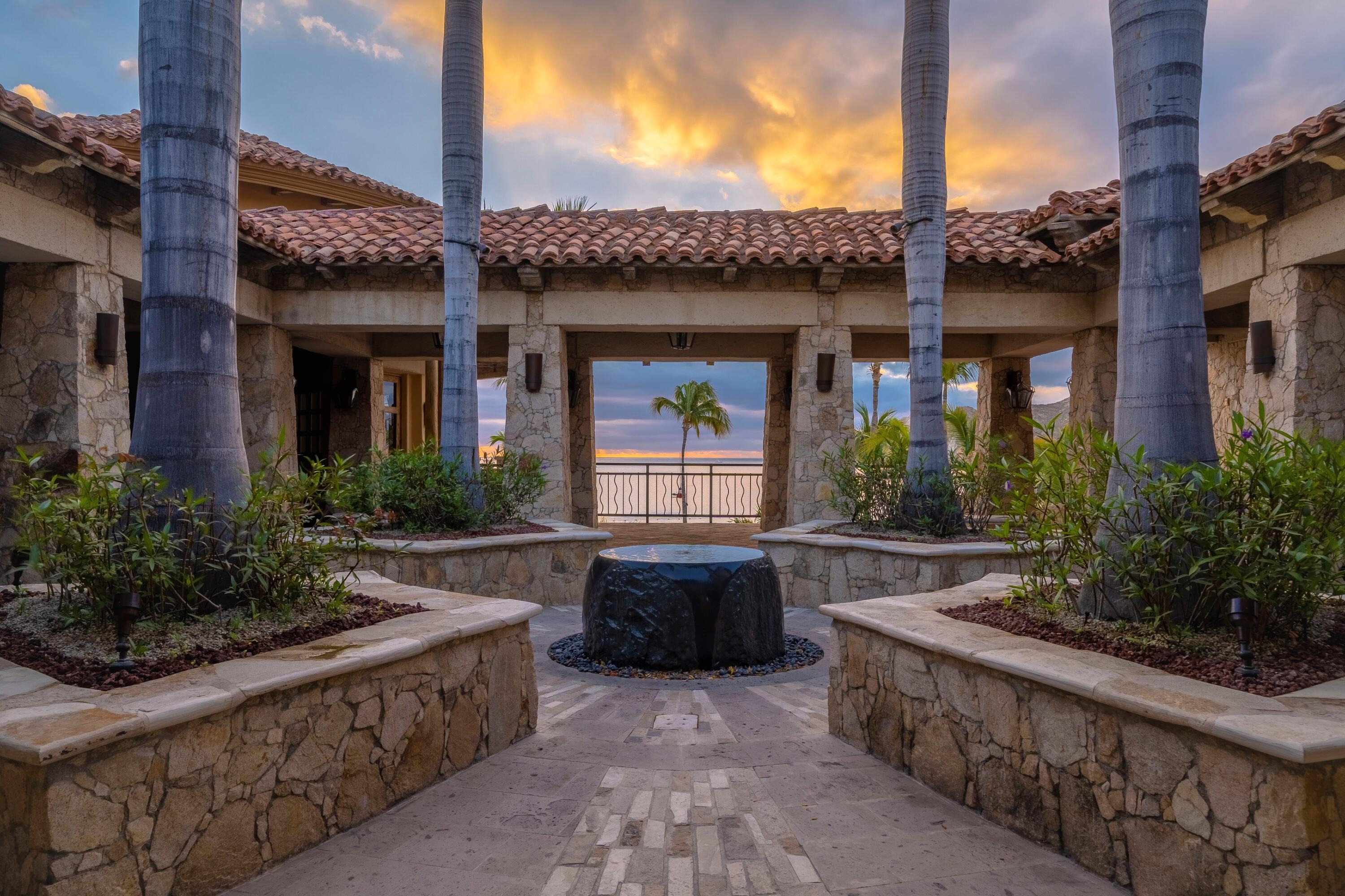 courtyard of a luxury home for sale in cabo san lucas