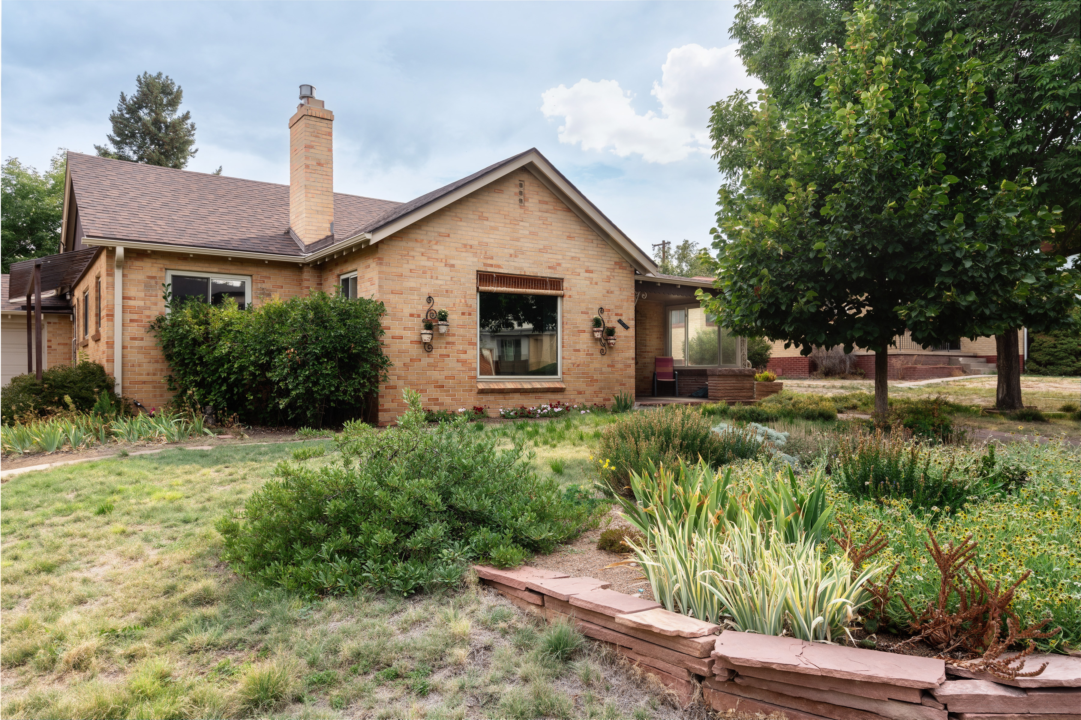 Front exterior and garden beds at 2635 Wolff Street near Sloan’s Lake