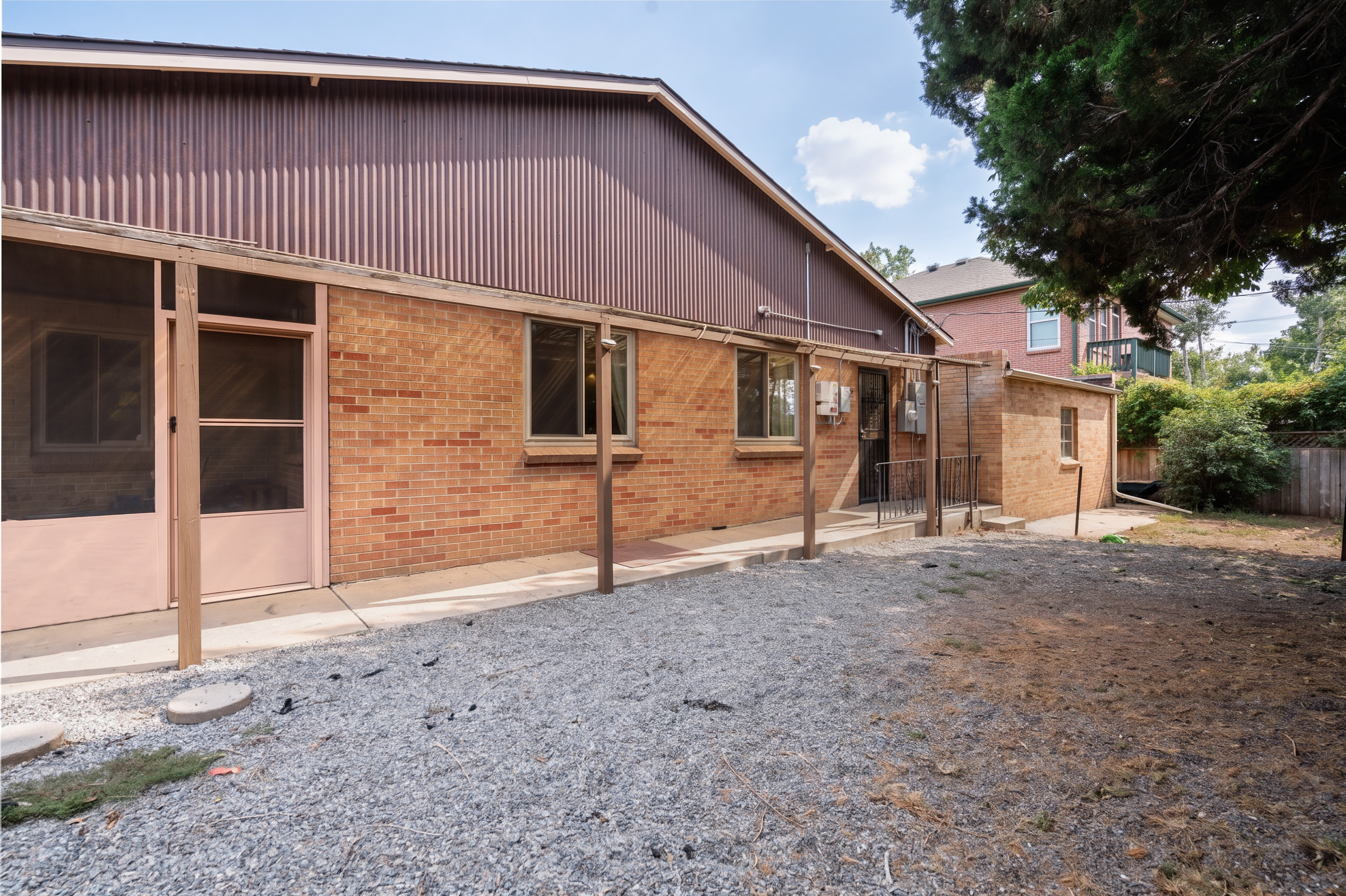 Backyard and screened patio at 2635 Wolff Street in Denver