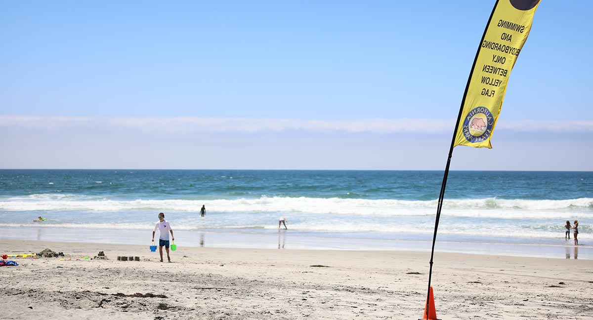 children playing in tide beach park