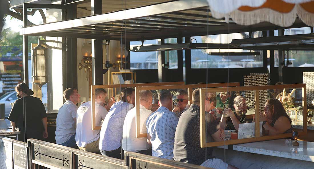 people sitting at the bar - kindred south park