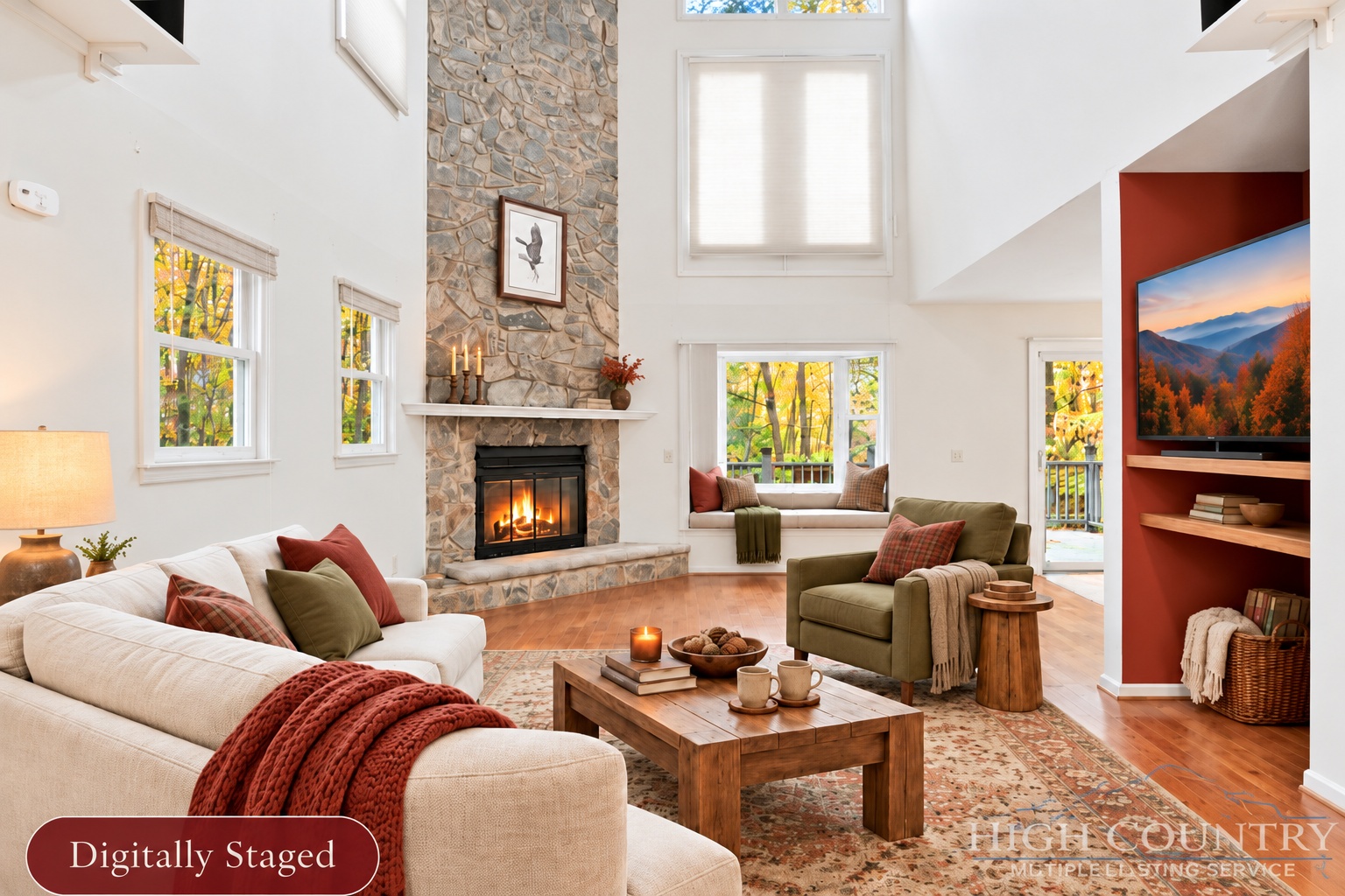 Digitally staged great room at 271 Quail Hollow Road with stone fireplace, vaulted ceiling and seating