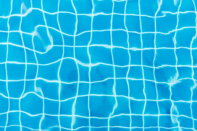 Water and blue pool tiles.