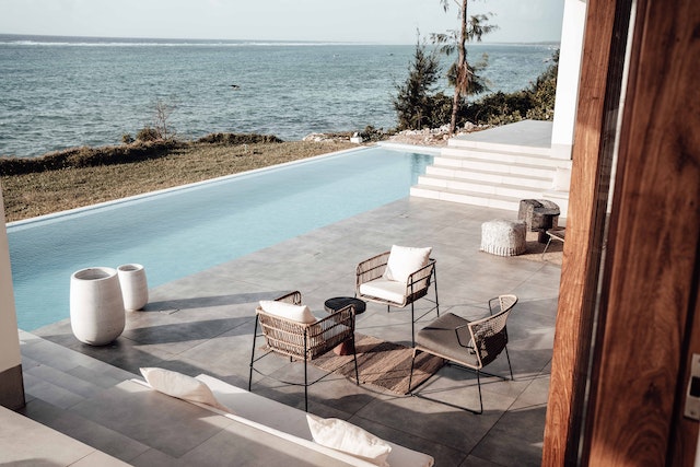 A house with a pool near the beach.