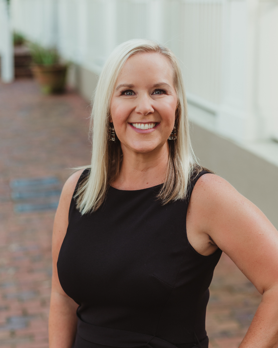 Kristen Rabell, Broker/Owner of Rabell Realty Group, photographed in Haile Village Center where she lives