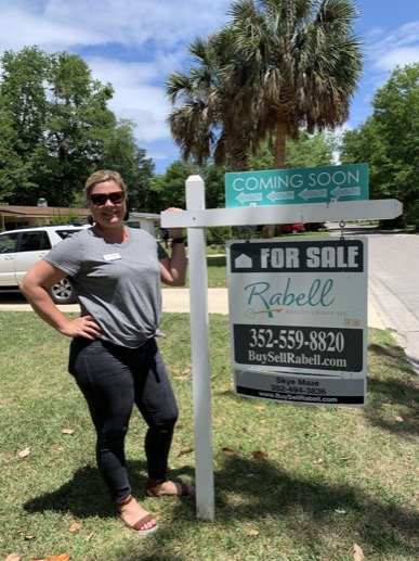 Skye Maze with a Rabell Realty Group listing sign
