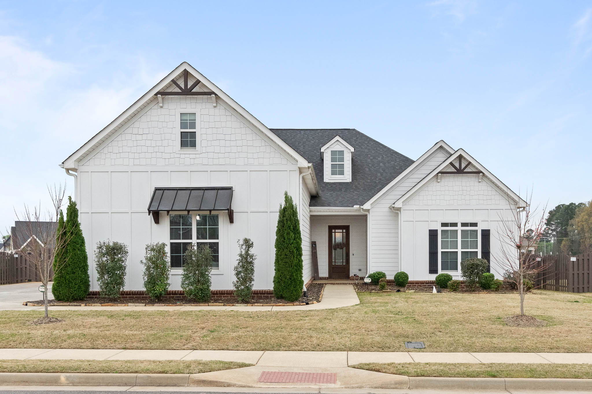 Welcome to 102 Parkland Hill Trace, an extraordinary former model home in 3 Park Preserve.