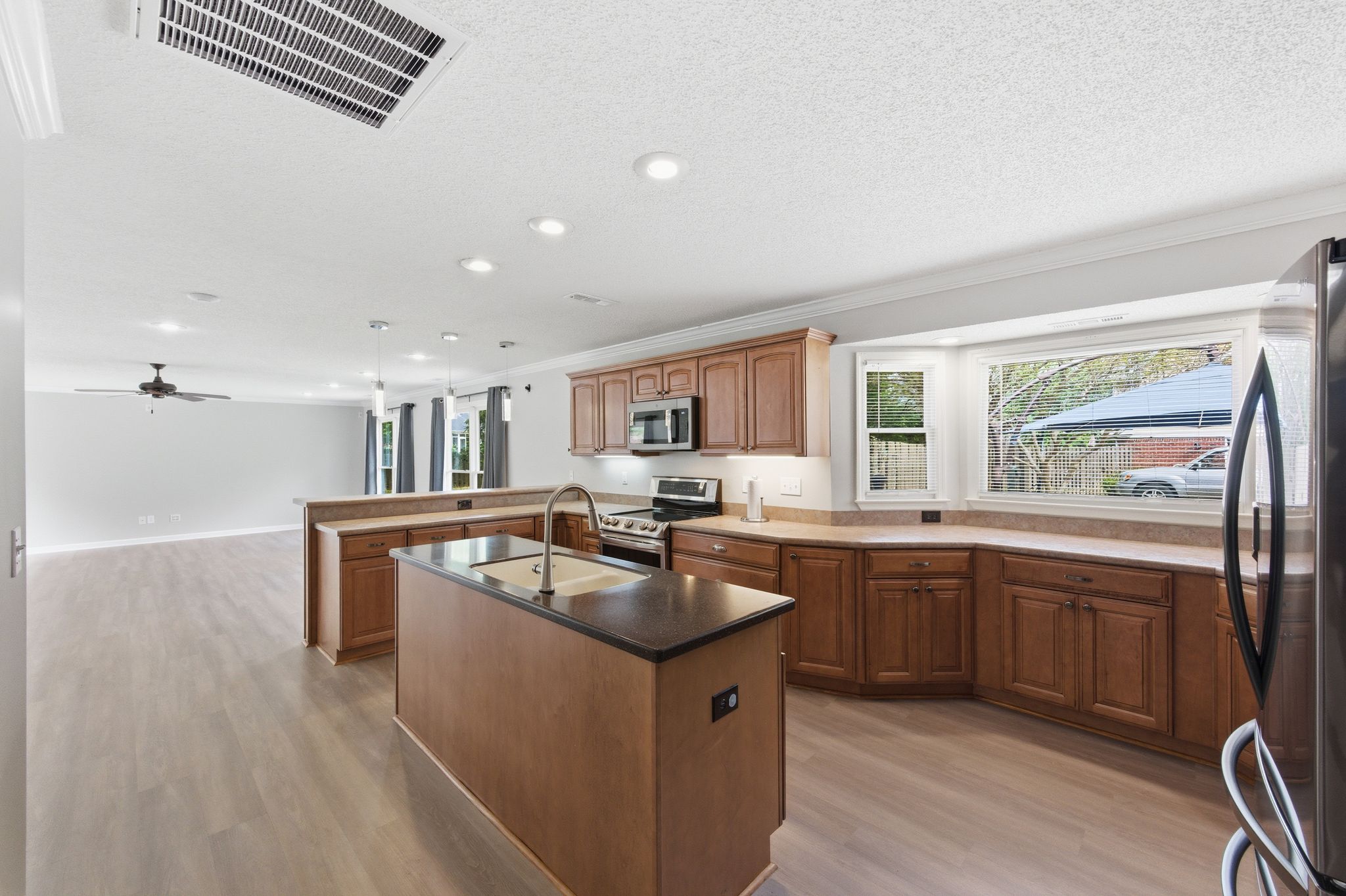 Perfectly situated for entertaining with a beautiful kitchen island and abundant natural light.