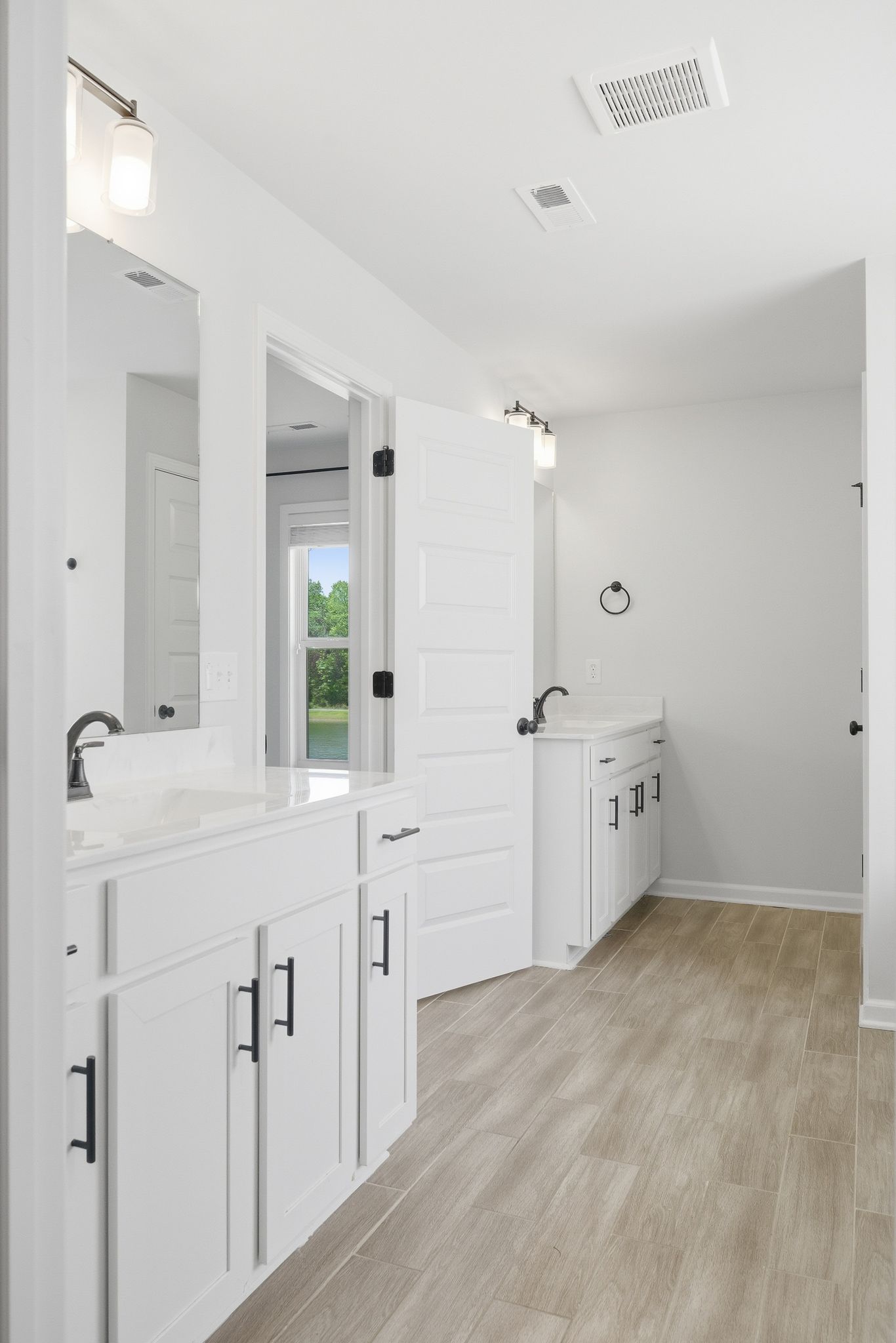 Retreat to the luxurious master suite.