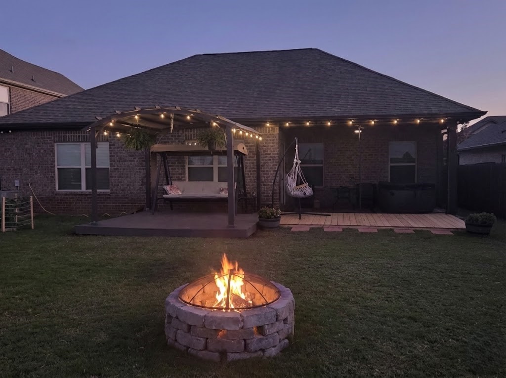 Twilight Picture of 235 Holt St Gazebo and Firepit
