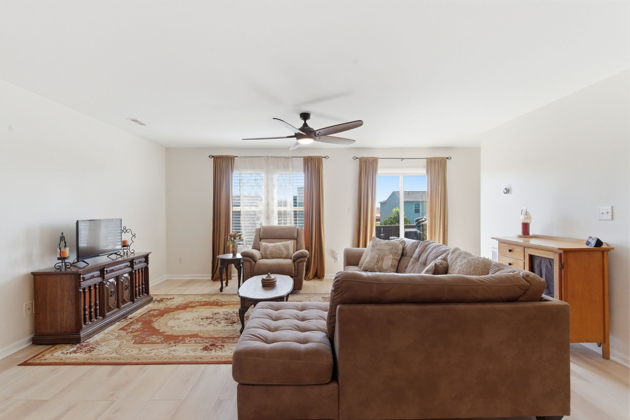 Expansive open floor plan with LVP flooring throughout.