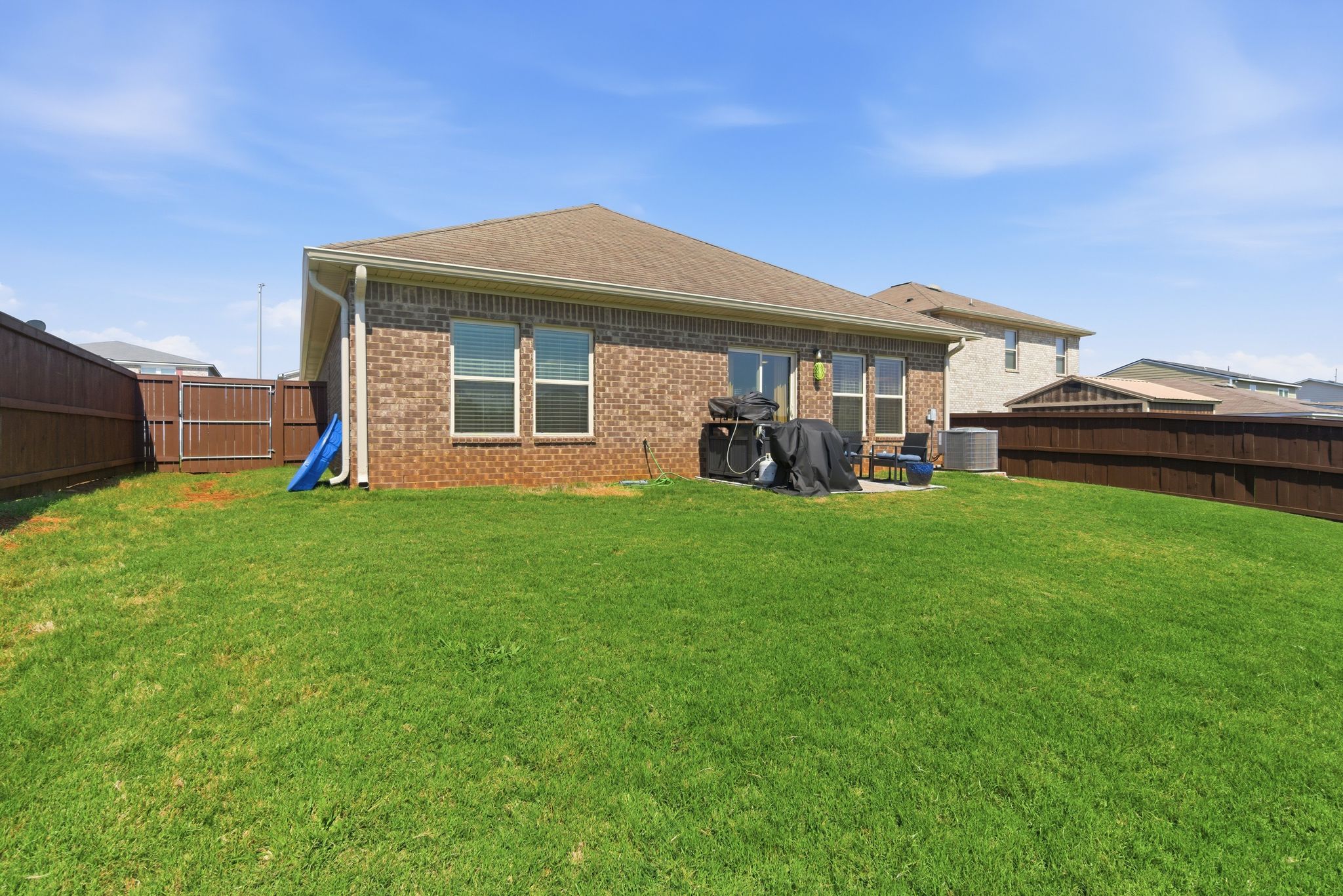Enjoy the fully fenced backyard oasis.
