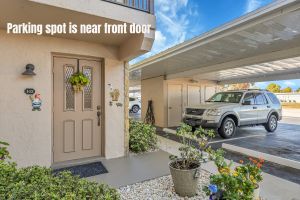 1304 Miramar 103 Front door and carport