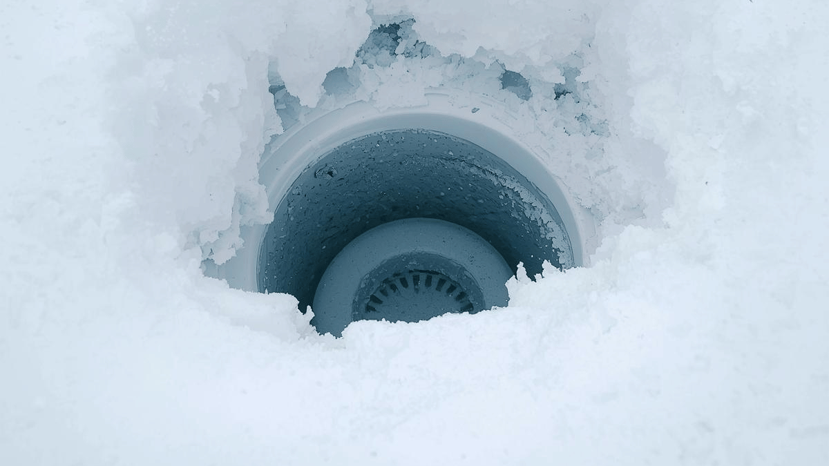 Snow-covered yard highlighting septic system location for rural properties in the Cariboo