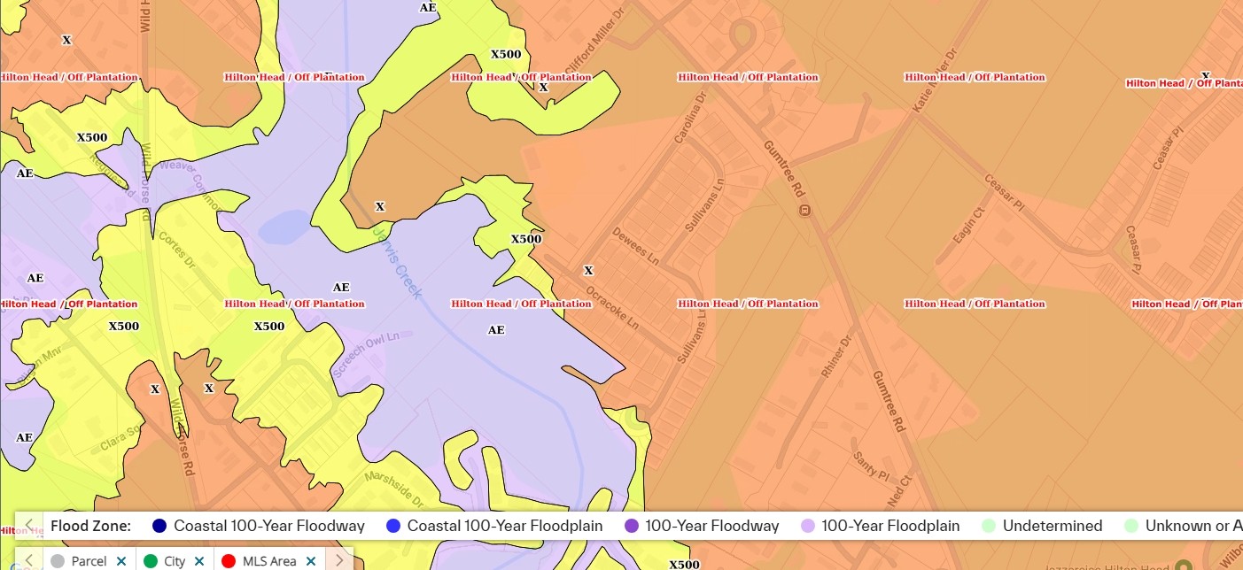 Beaufort County flood zone map showing Carolina Isles at the Gumtree Road and Carolina Drive intersection outside the mapped Special Flood Hazard Area, with AE and floodplain zones near Jarvis Creek to the west