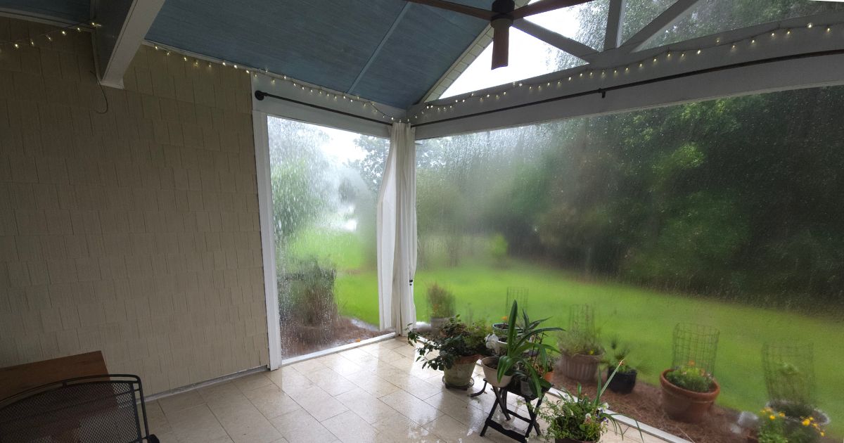 Screened lanai in Bluffton during a heavy Lowcountry summer storm