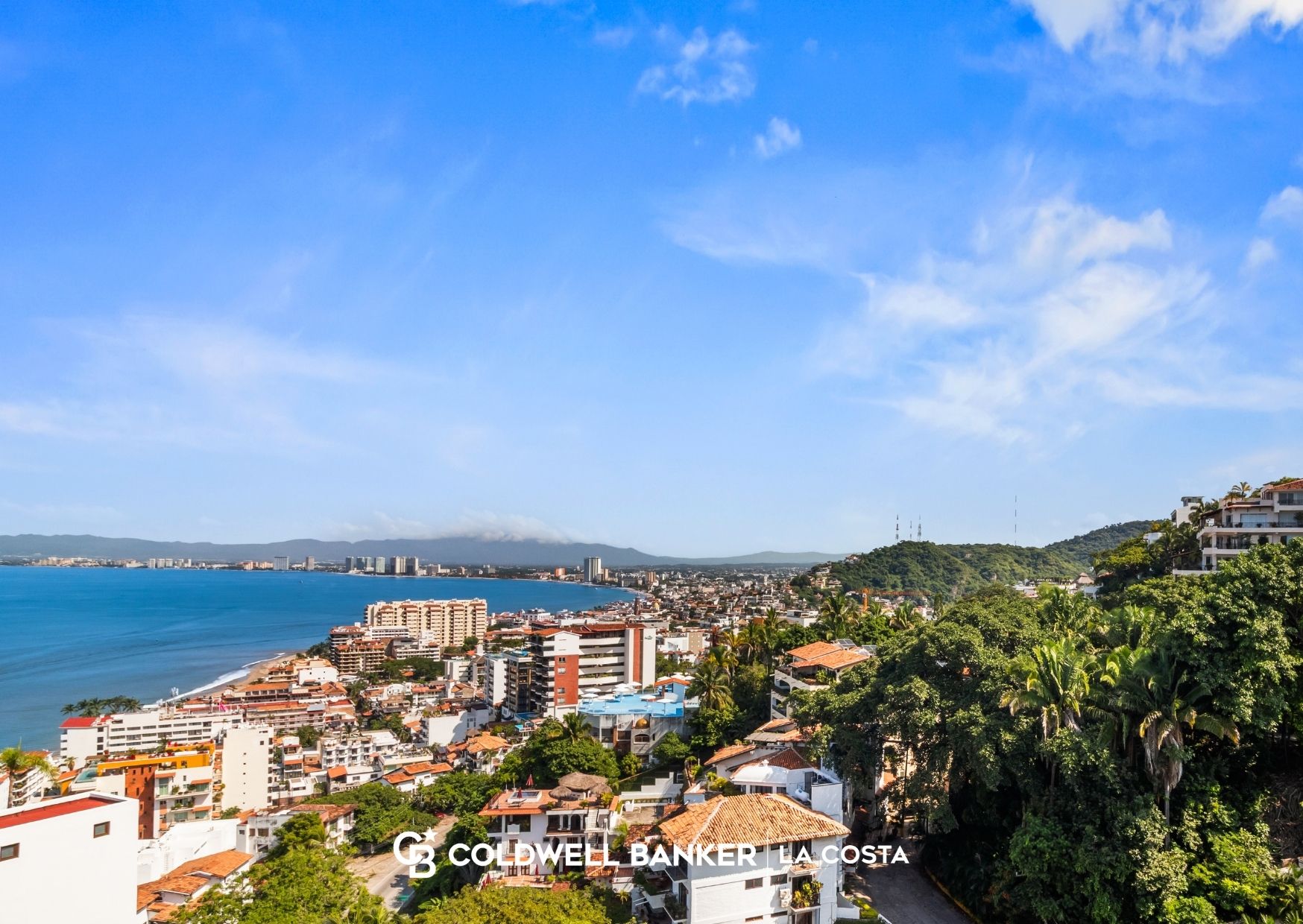 Cost to buy property in Puerto Vallarta, a waterfront condominium view across Banderas Bay