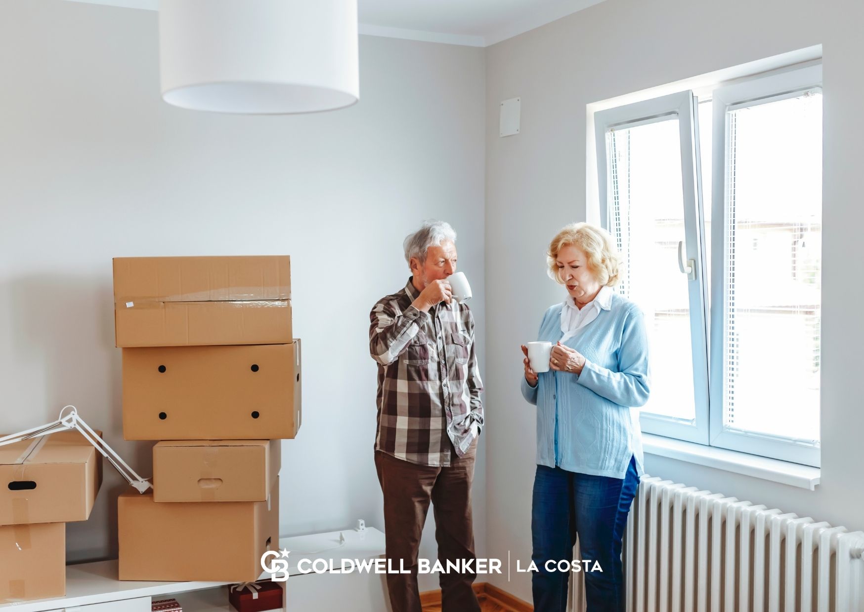 Couple moving to Puerto Vallarta Mexico from the United States and Canada, boxes and ocean view relocation