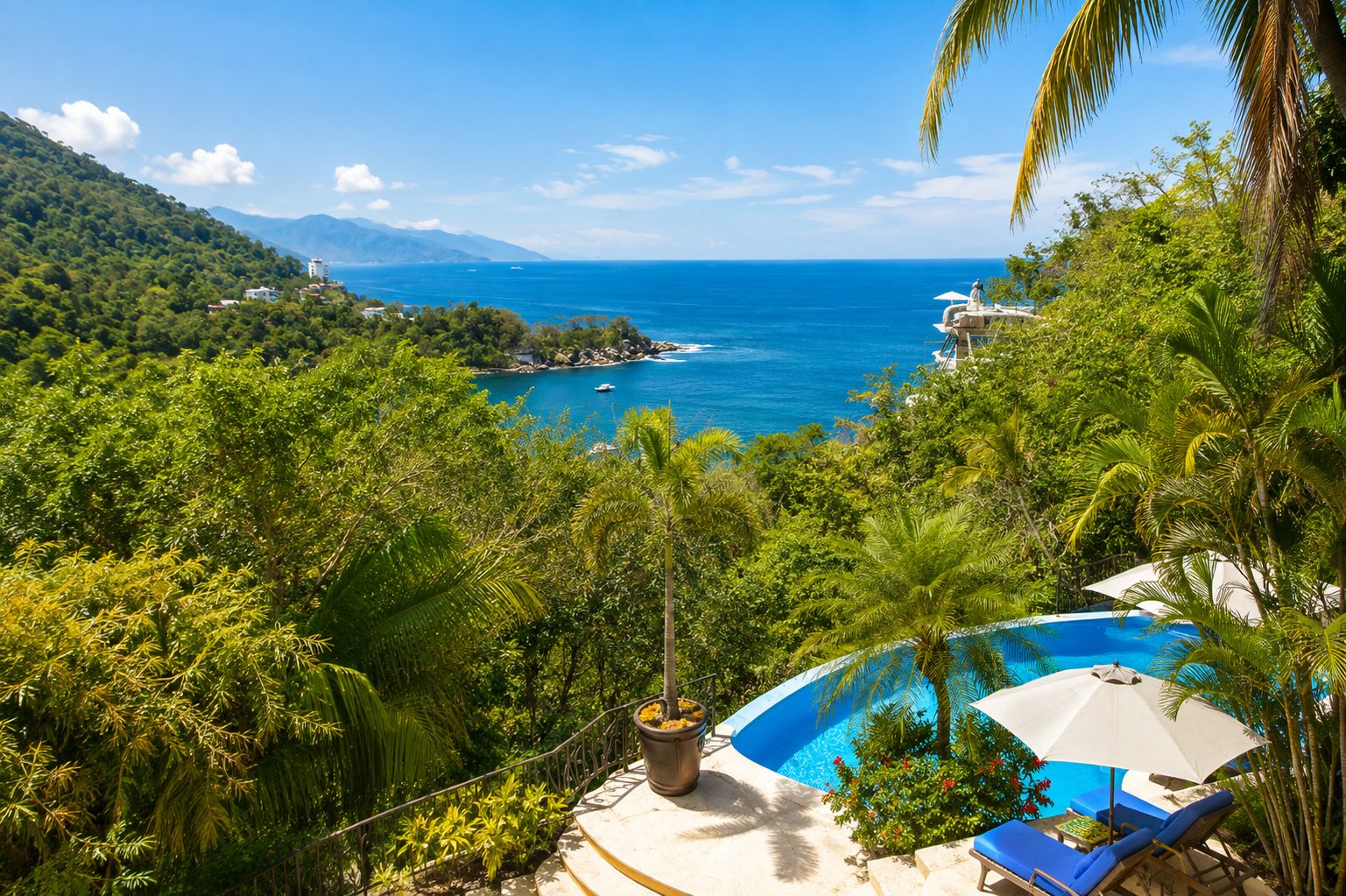 Pool terrace at Casa Kalista overlooking Mismaloya Bay and the jungle hillside, Puerto Vallarta South Shore