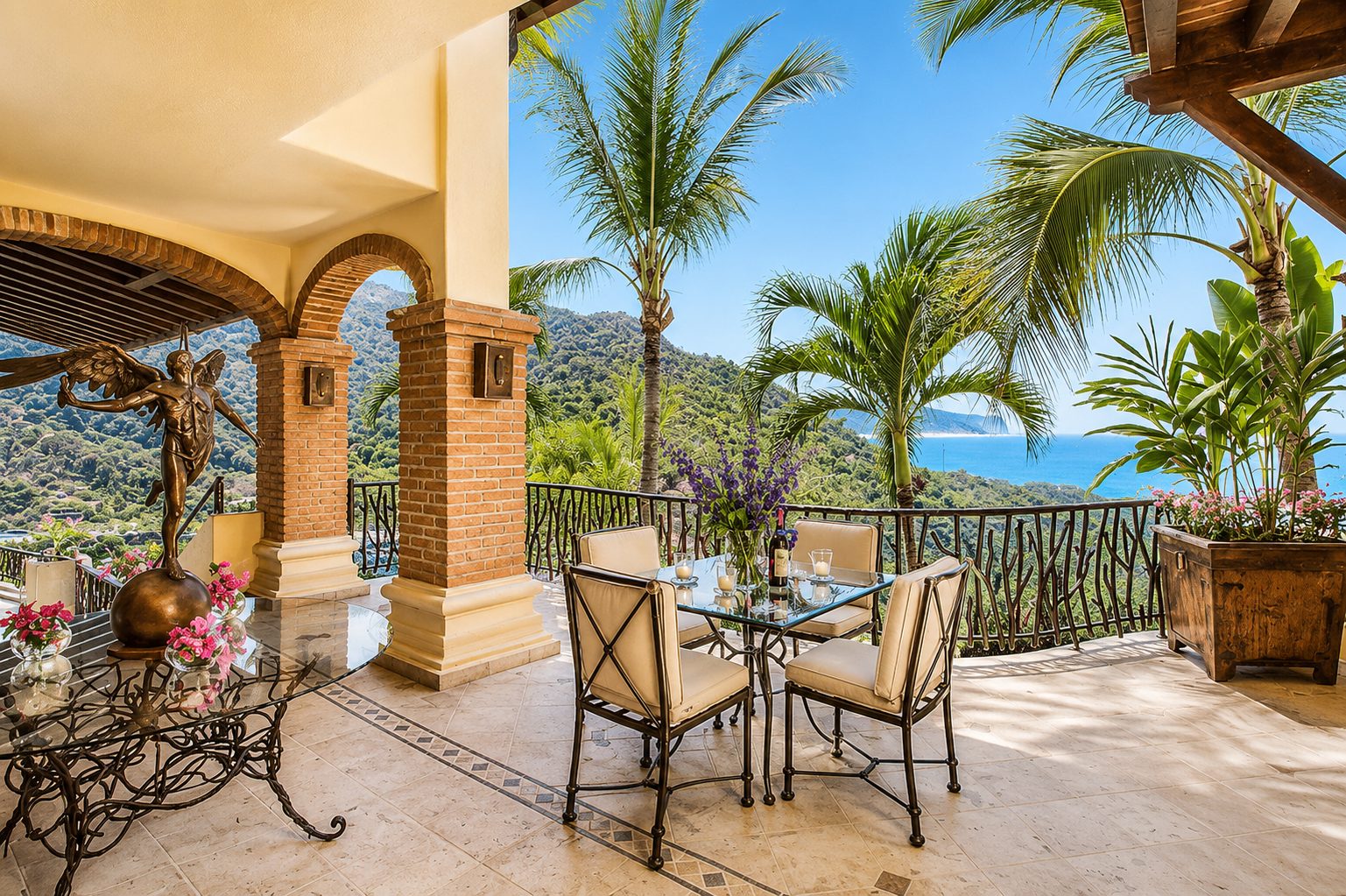 Arched terrace with dining table and ocean view