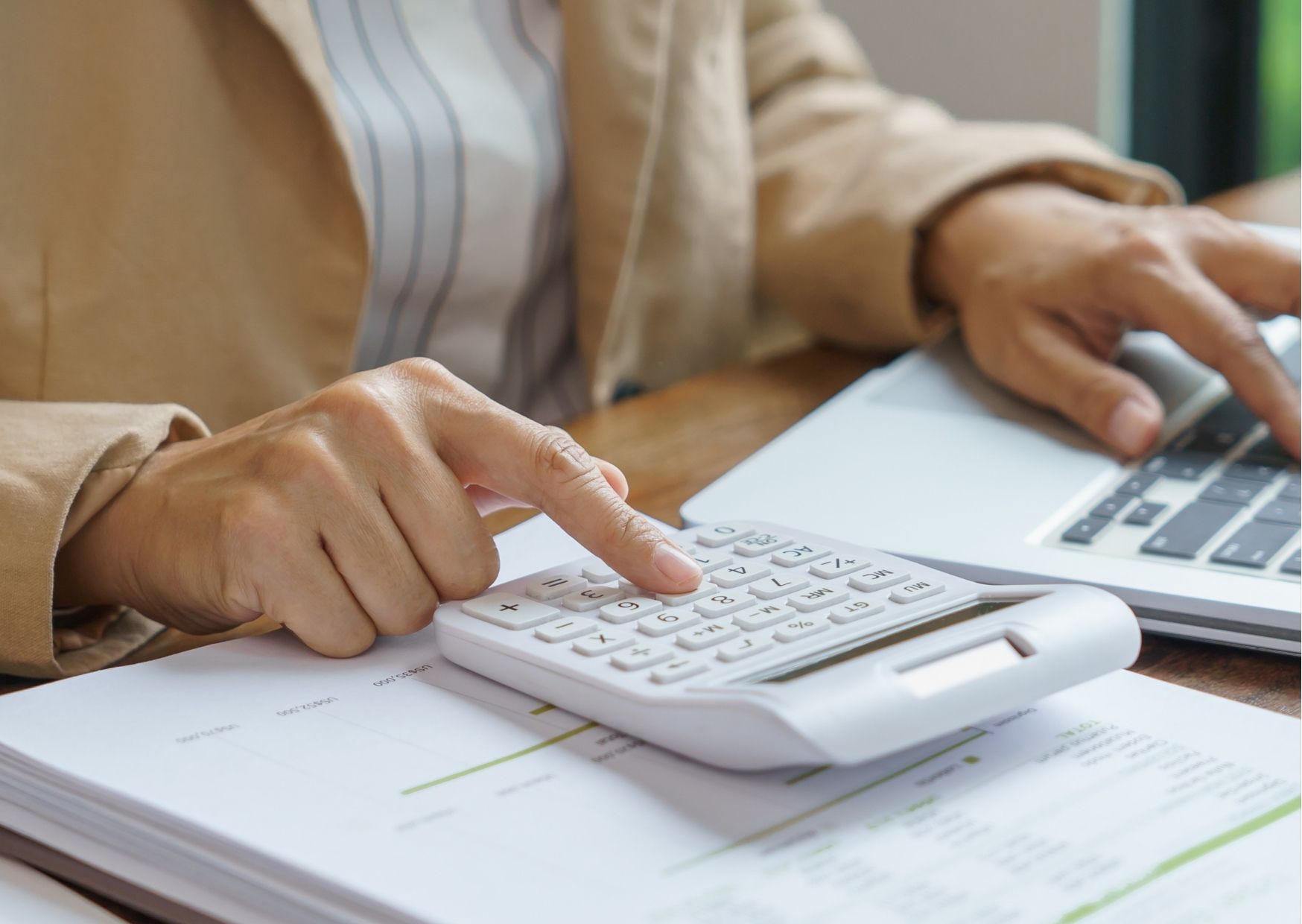 Puerto Vallarta closing costs in Mexico, a buyer reviewing notario fees and acquisition tax on a condominium purchase