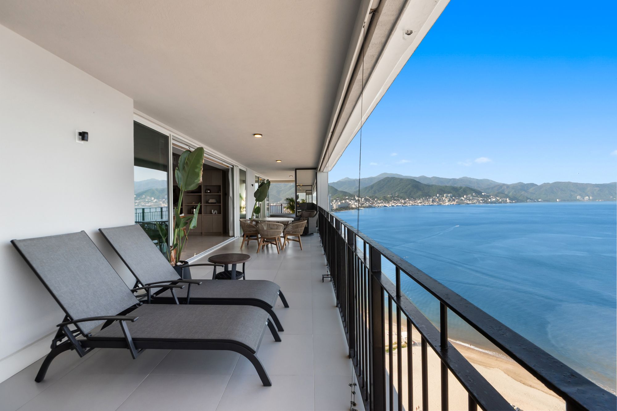 Sun loungers along the ocean-side terrace