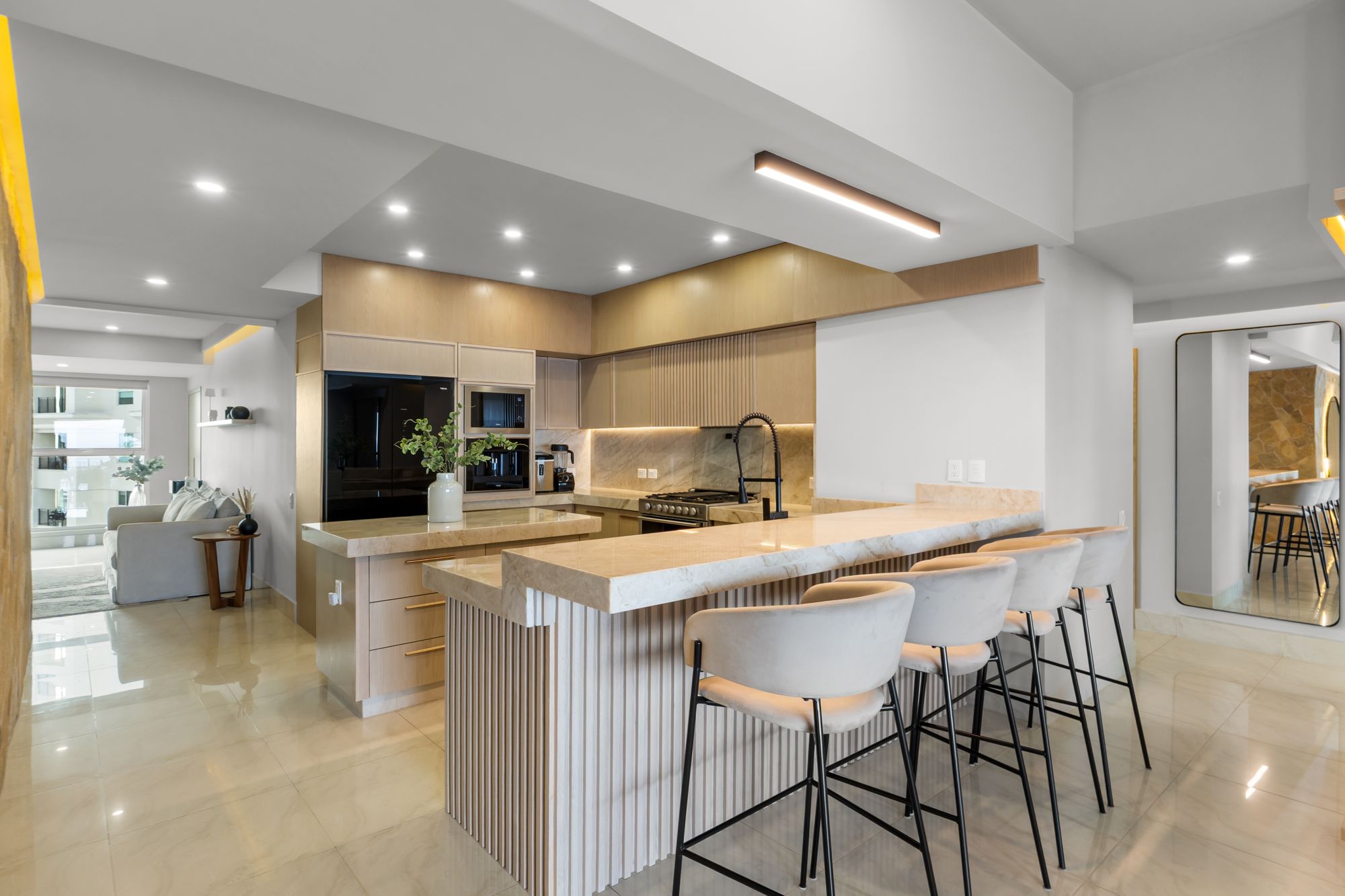 Kitchen island and breakfast bar seating four