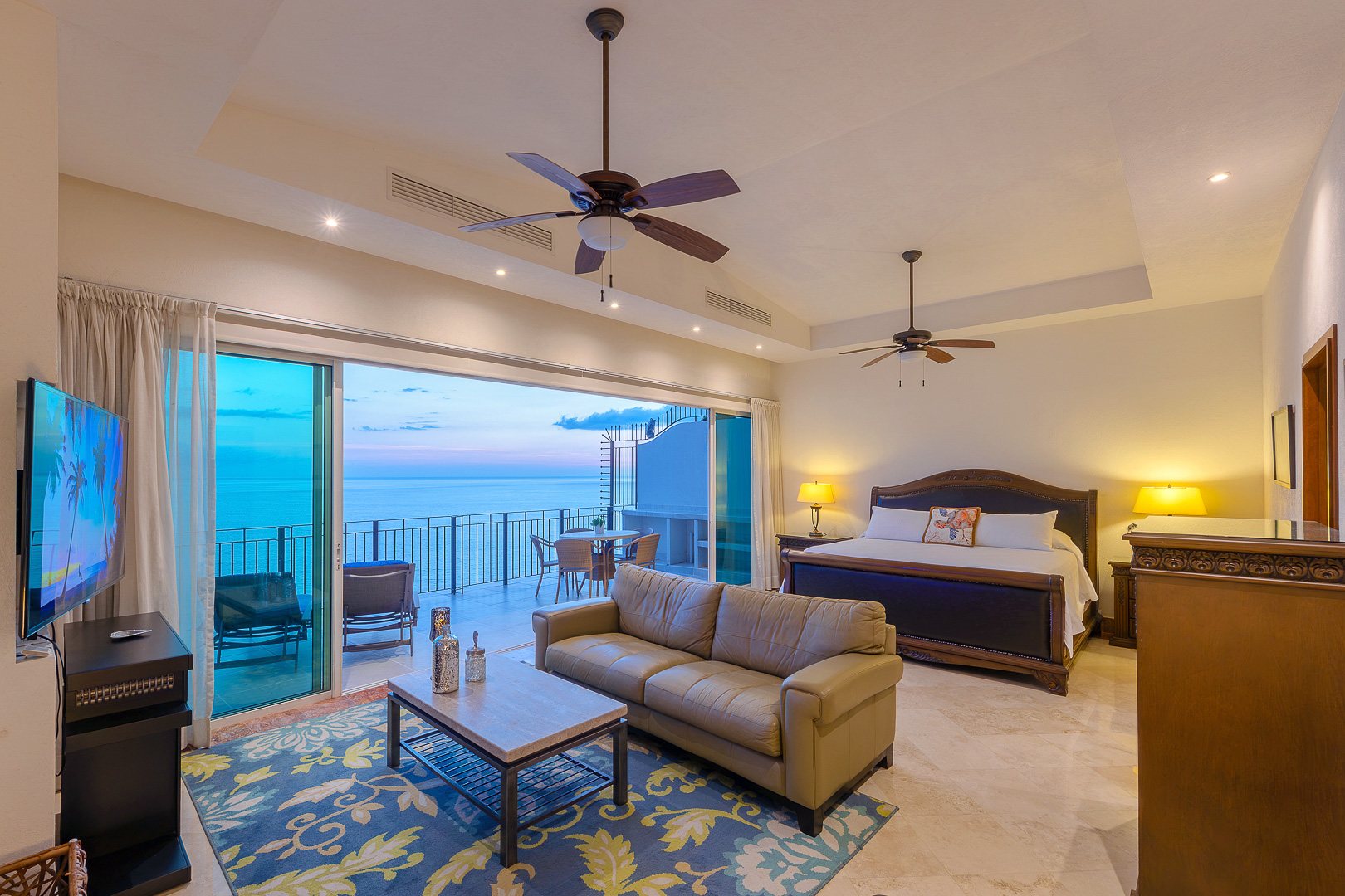 Primary suite on the upper floor, open to its private terrace