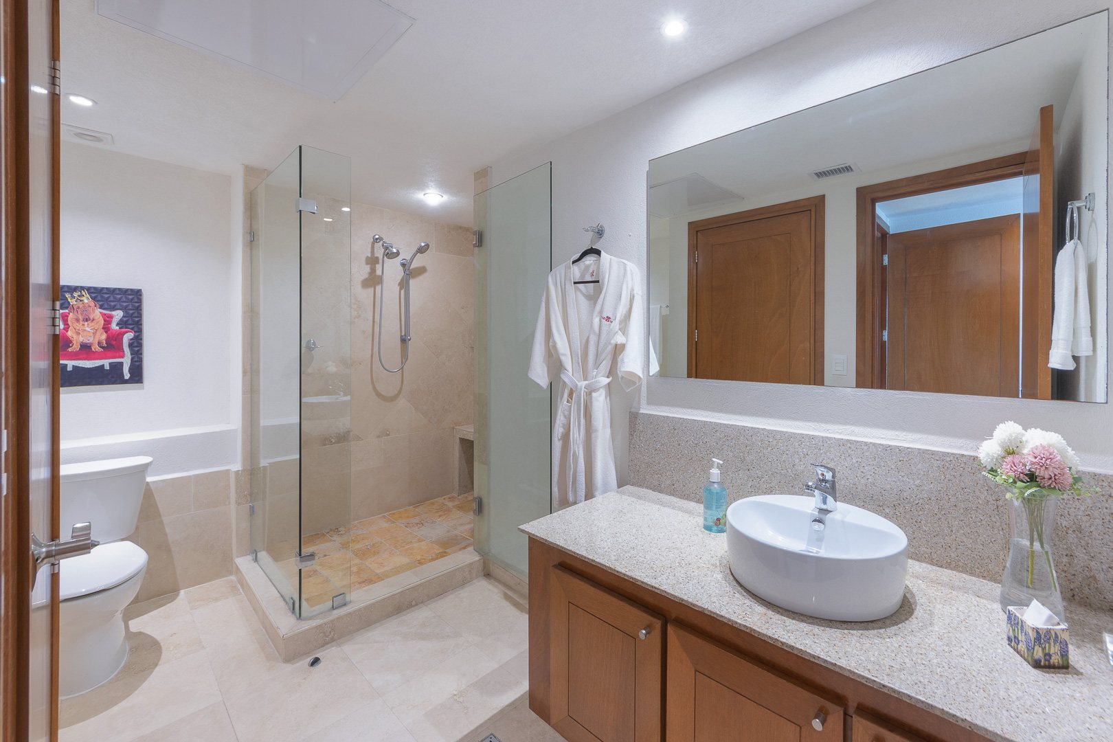 Bathroom with glass shower and soaking tub