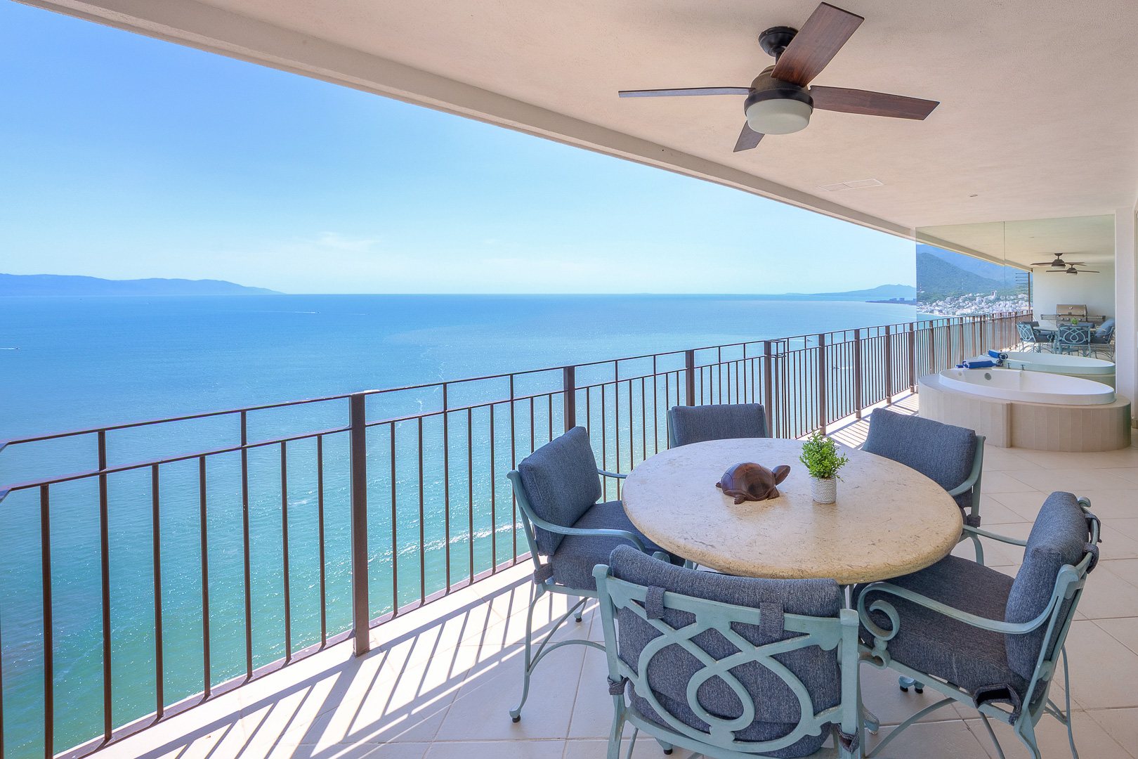 Outdoor dining table on the ocean terrace
