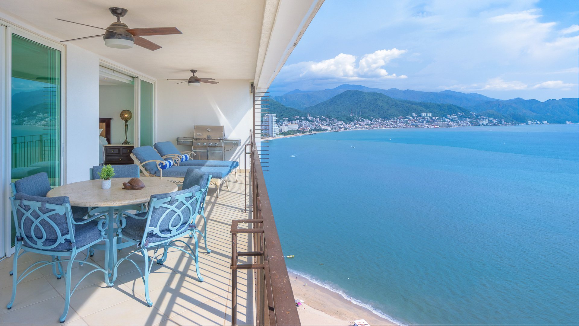 Ocean terrace looking across the bay to Puerto Vallarta and the Sierra Madre