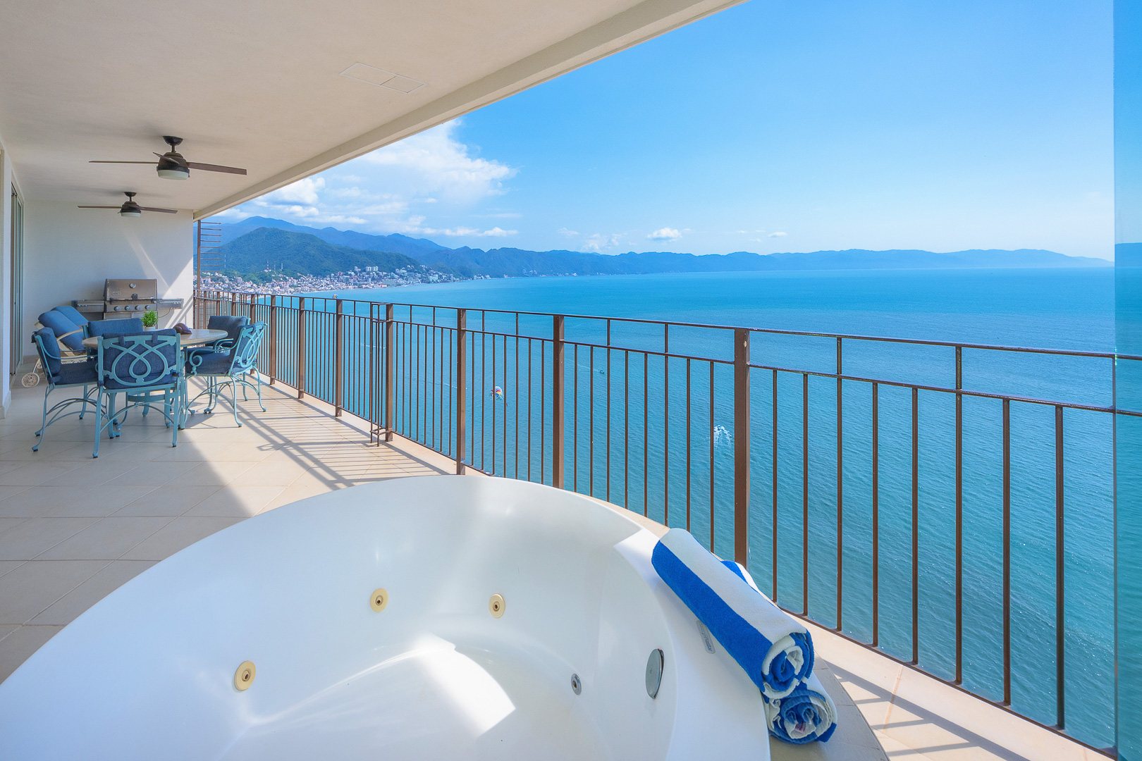 Terrace jacuzzi facing the open bay
