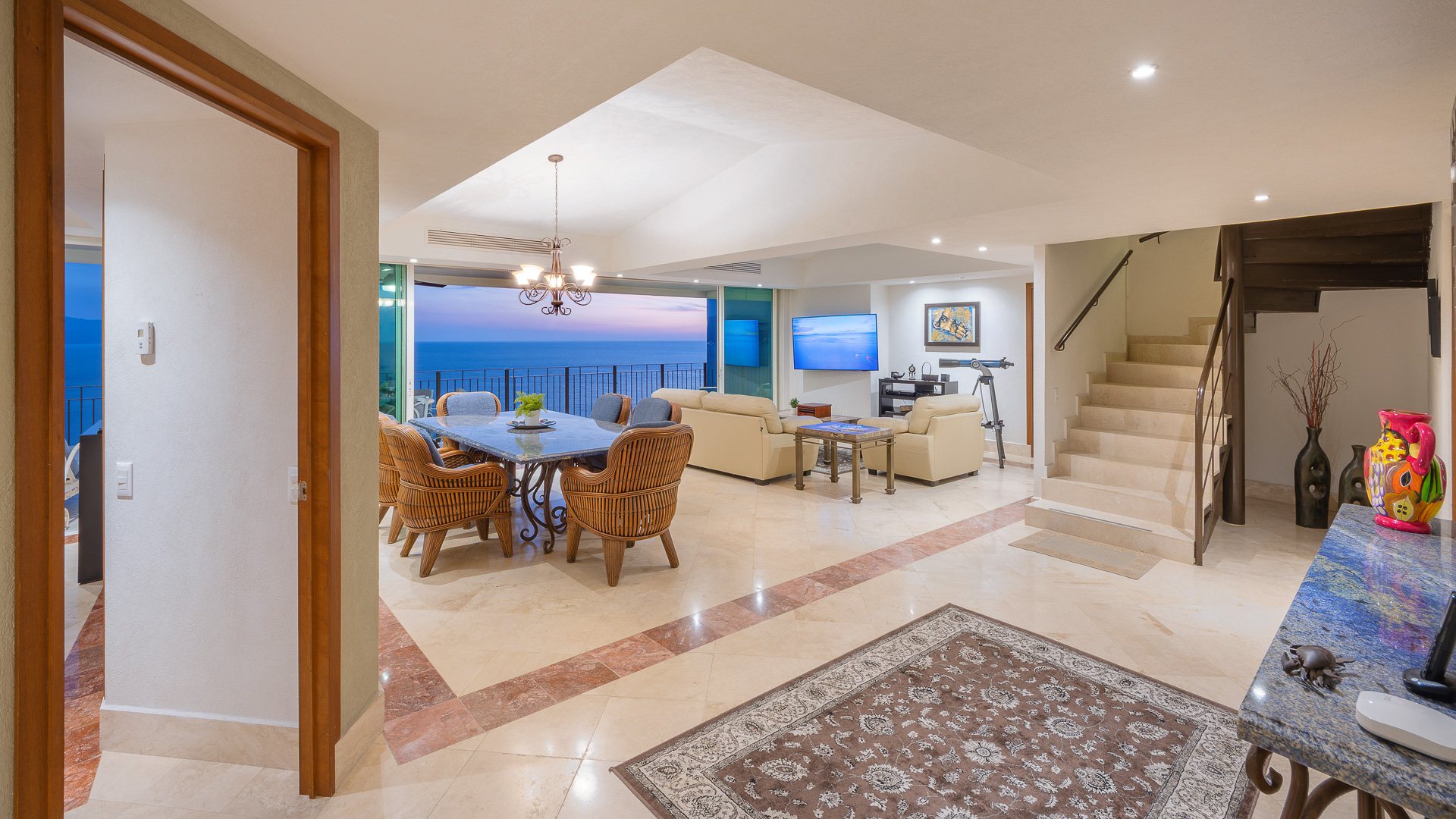 View from the entry across the dining room to the ocean