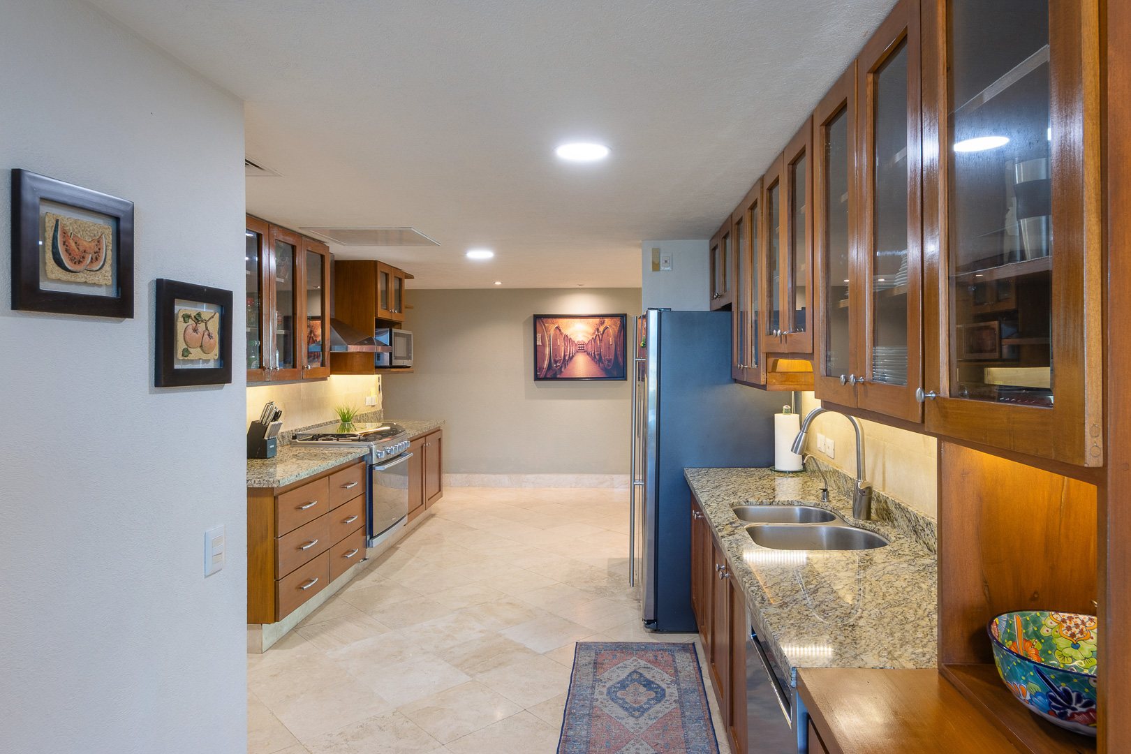 Kitchen work area with glass-front cabinets