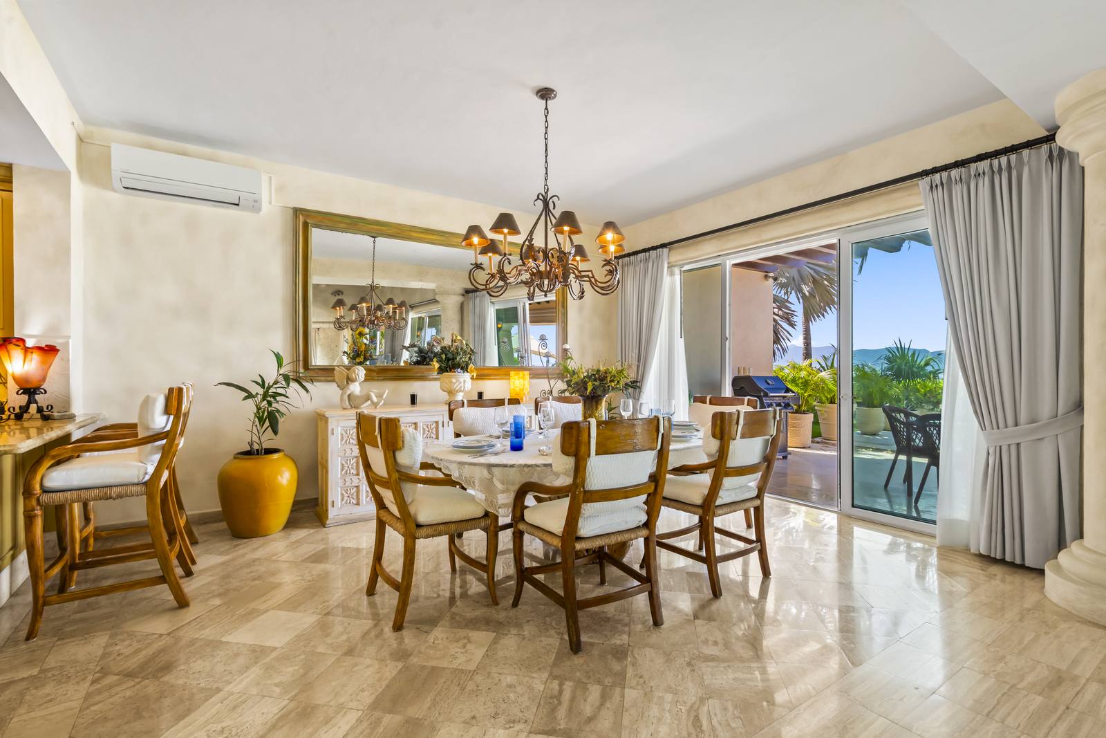 Breakfast nook with doors to the terrace and ocean views